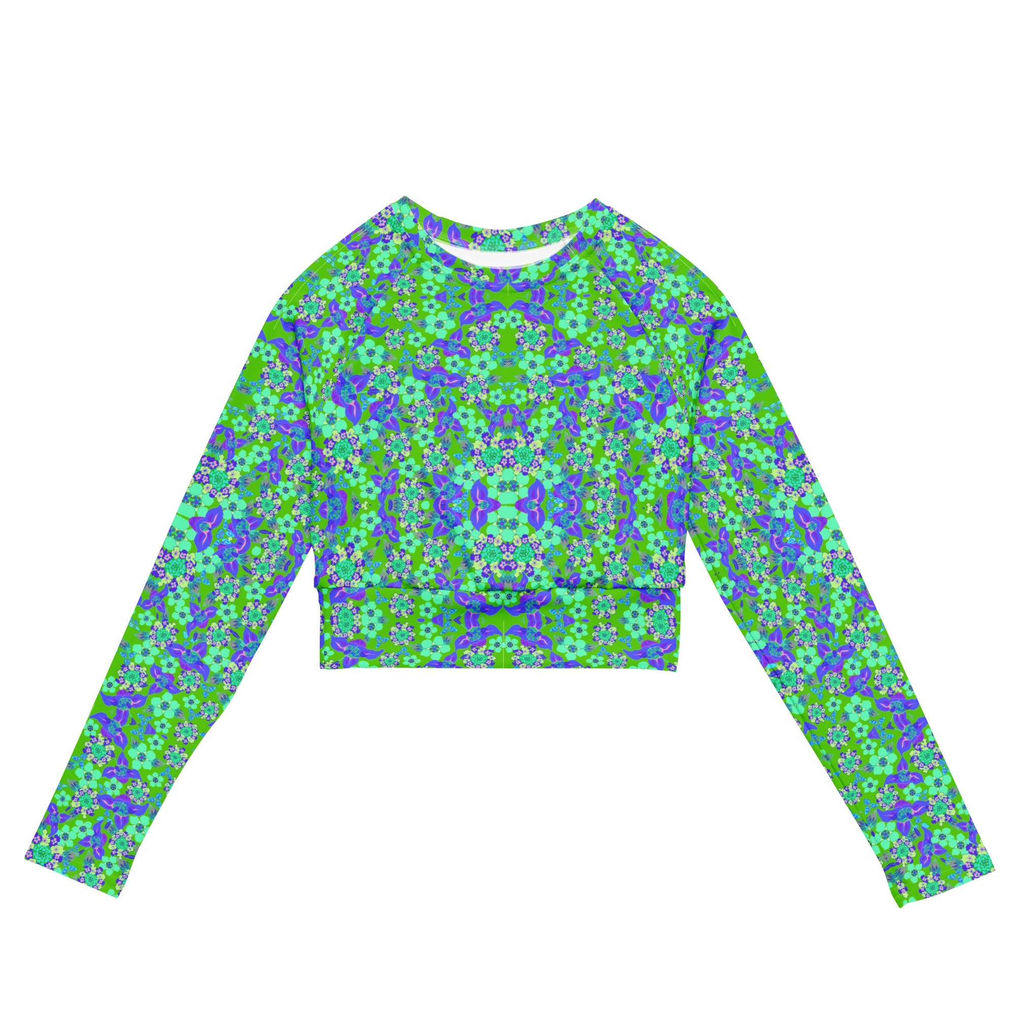 Long-sleeve crop top with a vivid all-over floral-inspired pattern in green, turquoise, and purple.