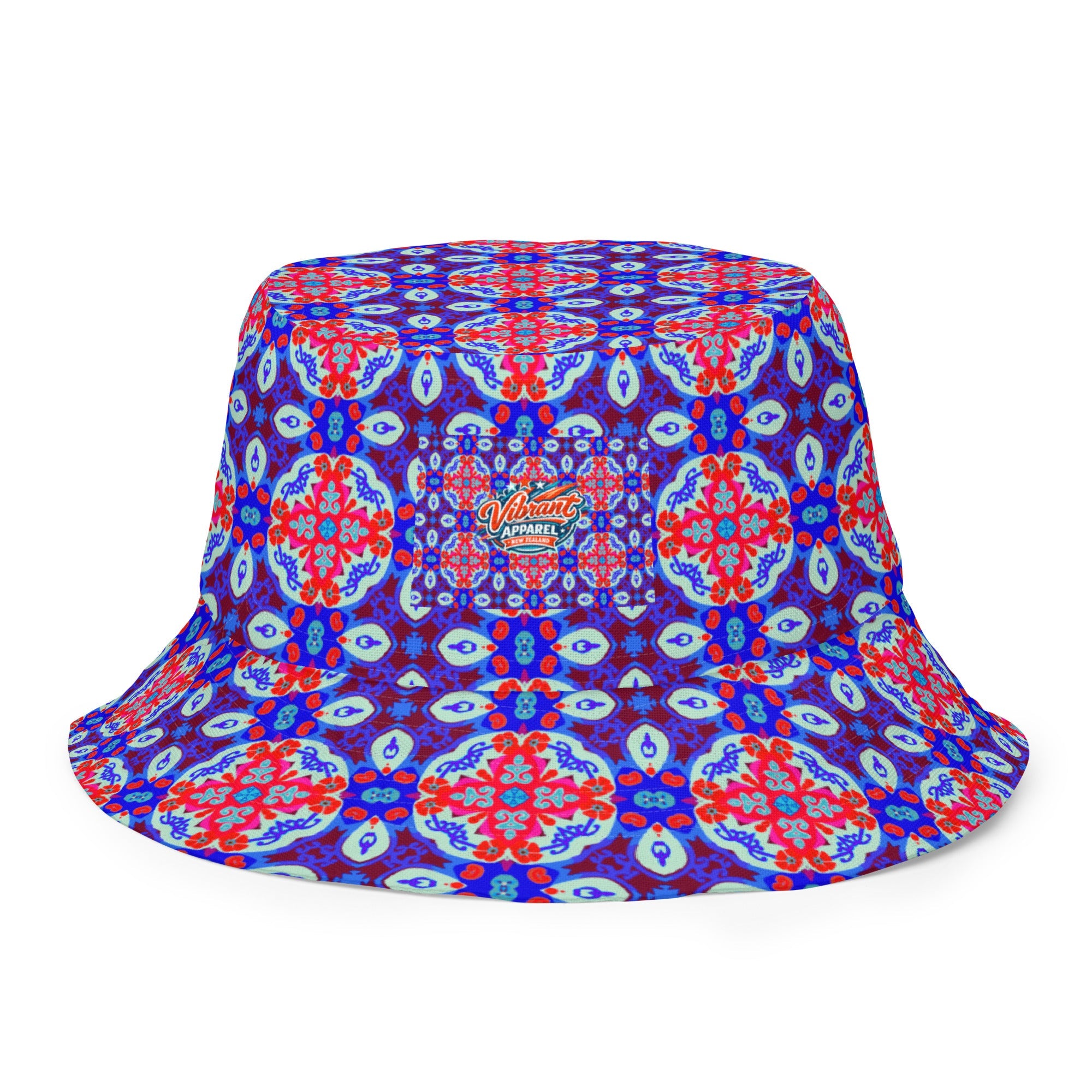Bucket hat with a bold blue, red, and aqua kaleidoscope-inspired print and an all-over symmetrical pattern.