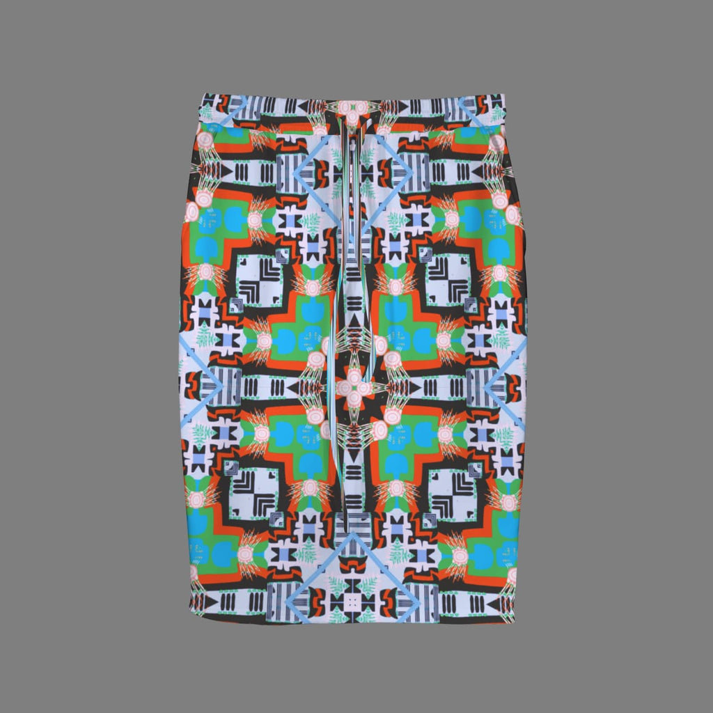 Flat lay studio shot of the front of a knee-length pencil skirt showcasing a matching drawstring tie waist and an intricate, colorful kaleidoscopic print against a solid grey background.