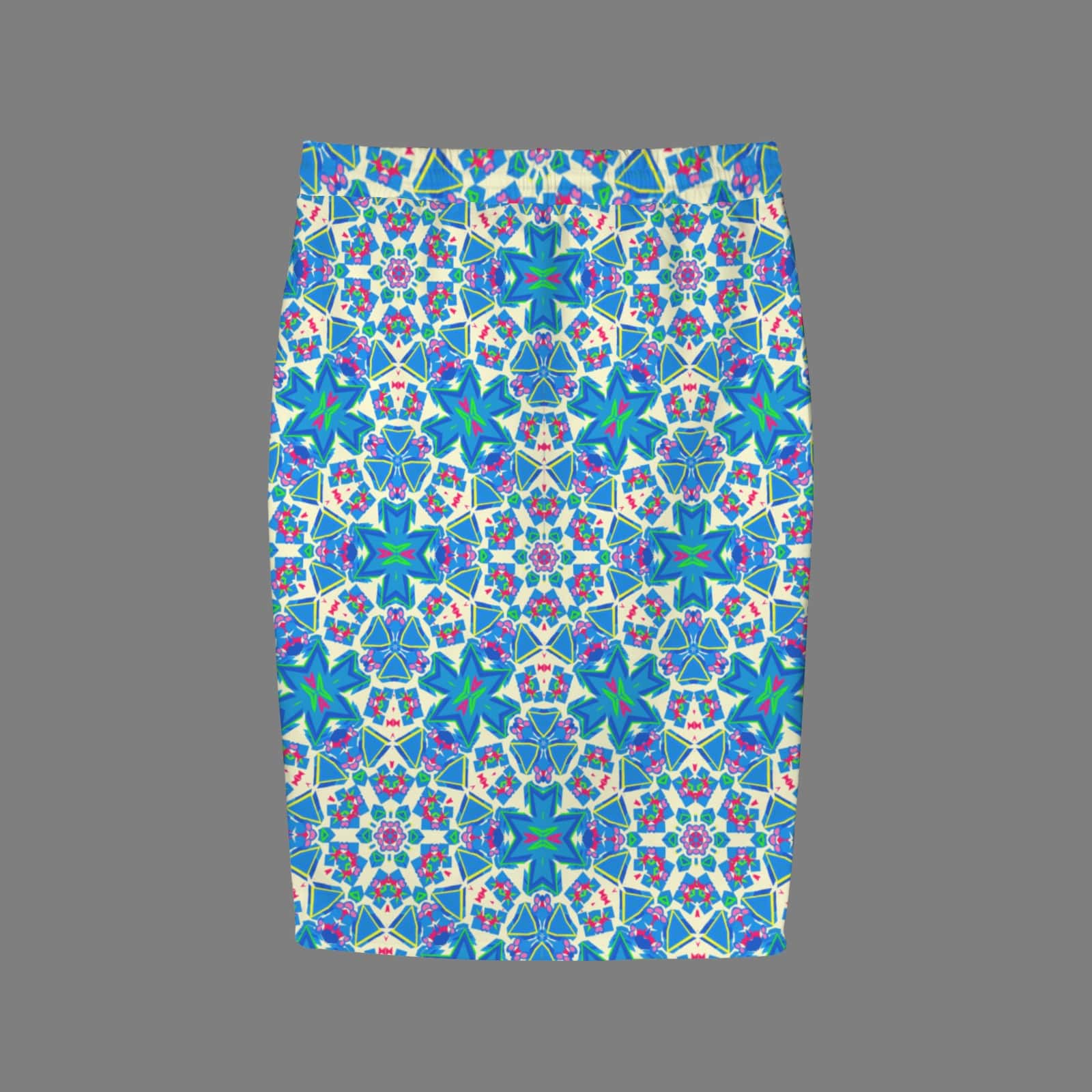 Flat lay studio shot of the back of a knee-length pencil skirt featuring a bold, symmetrical tribal geometric pattern in bright orange, vibrant green, sky blue, and black against a solid grey background.