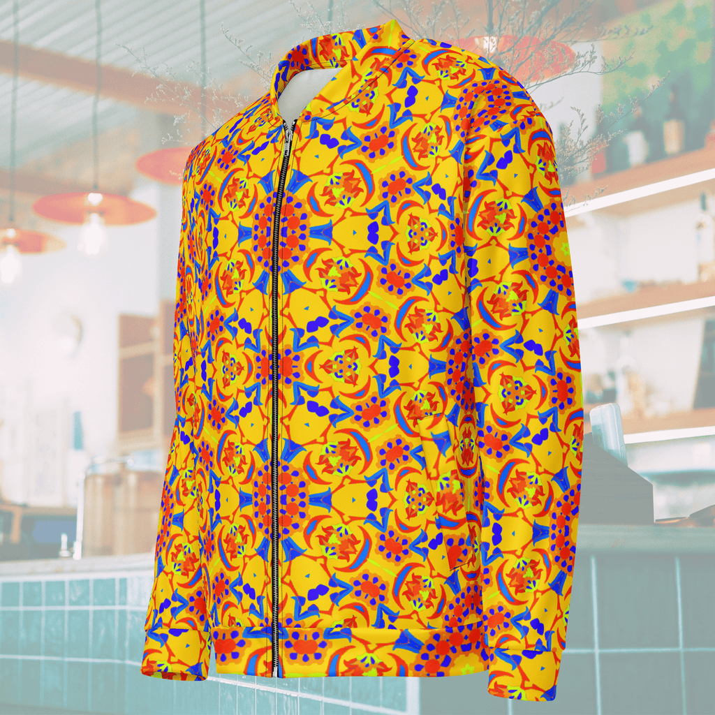 Right Angled ghost mannequin display of a vibrant yellow patterned bomber jacket, highlighting the ribbed collar, side pocket placement, and continuous geometric print across the sleeve.
