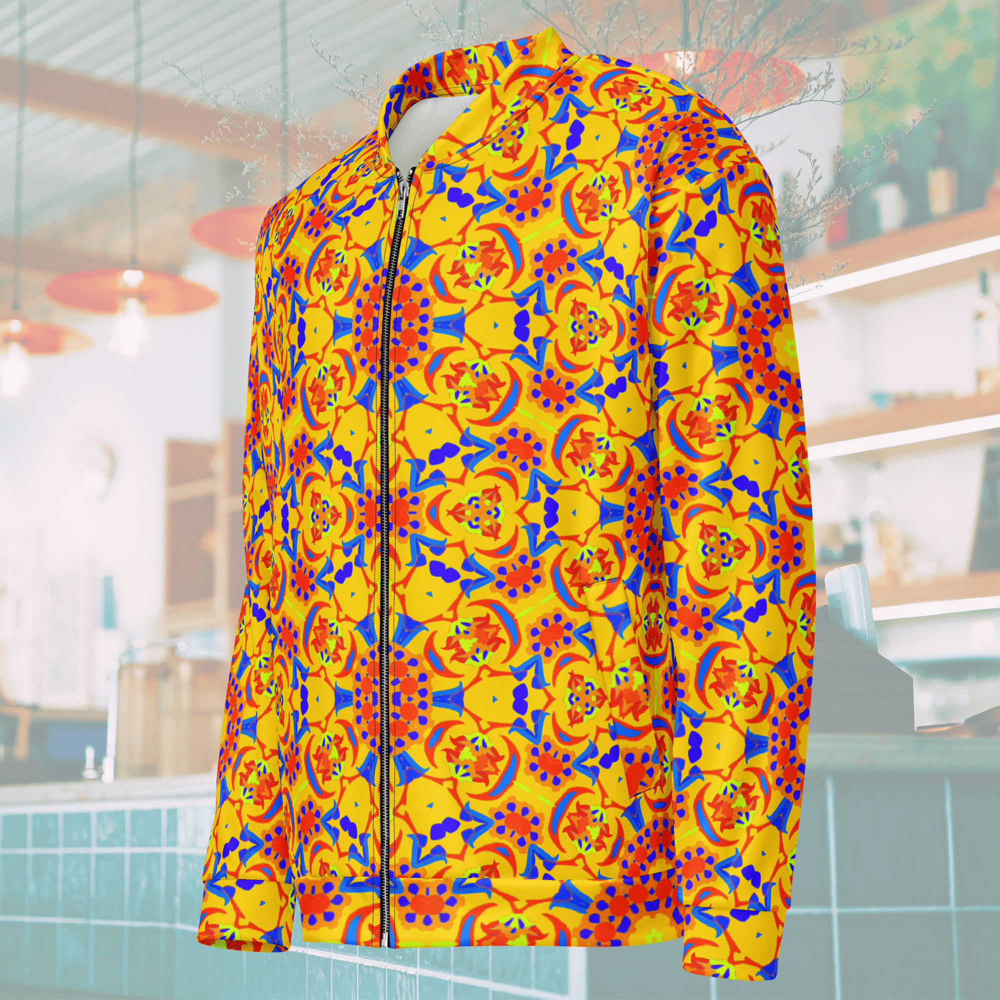 Right Angled ghost mannequin display of a vibrant yellow patterned bomber jacket, highlighting the ribbed collar, side pocket placement, and continuous geometric print across the sleeve.