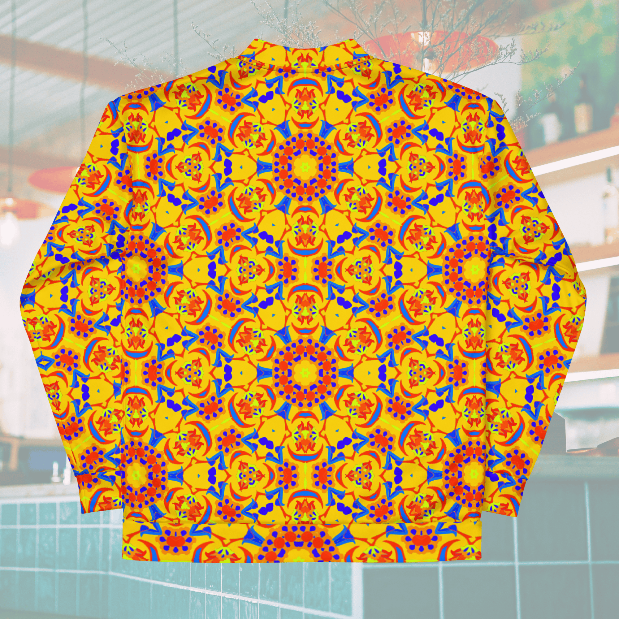 Full back view of a yellow zip-up bomber jacket laid flat, displaying a striking, symmetrical arrangement of large circular geometric mandala art designs.