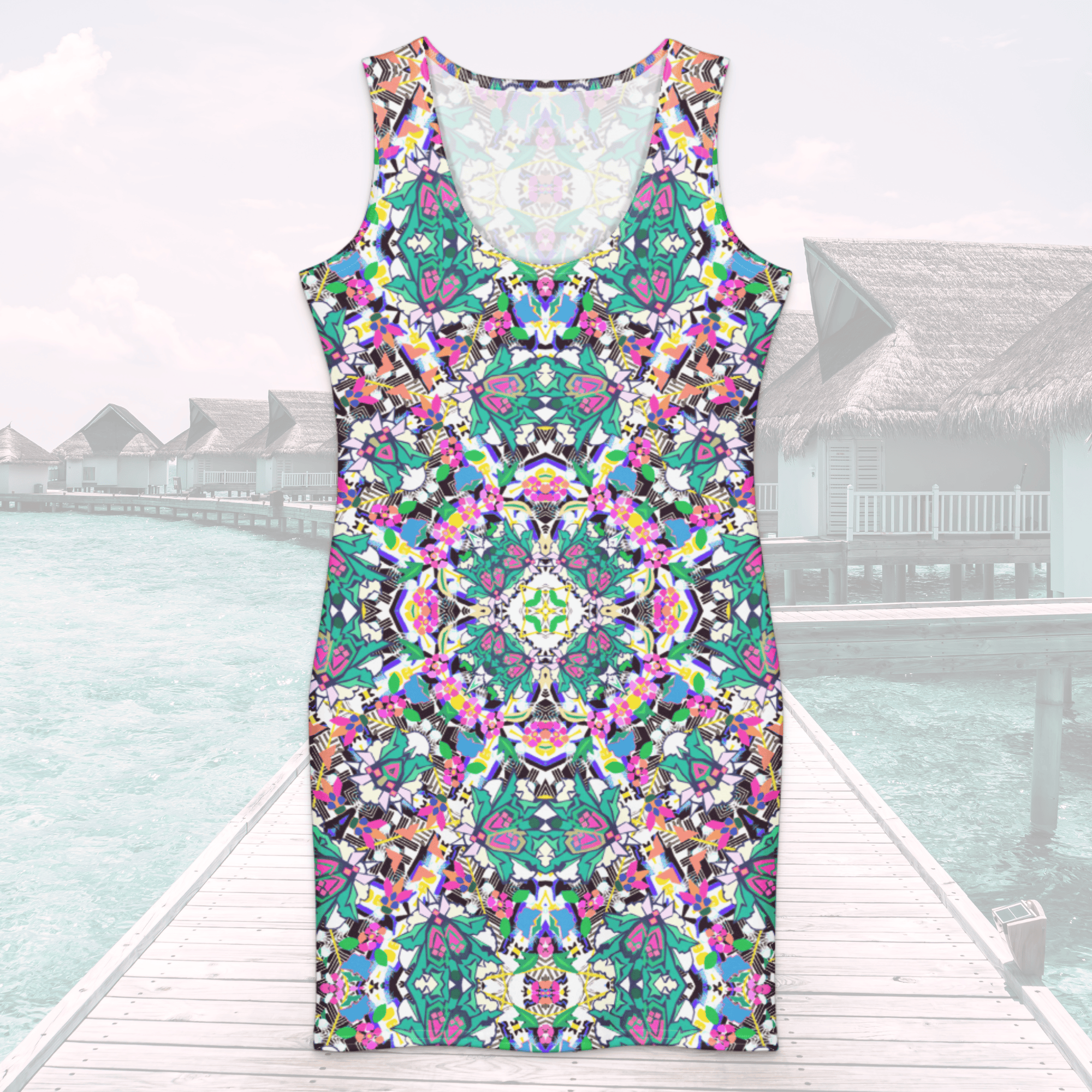 Product mockup showing the front scoop-neck view of a sleeveless bodycon dress with an intricate, colorful mandala pattern. The background features a tropical resort setting with a boardwalk and overwater villas.