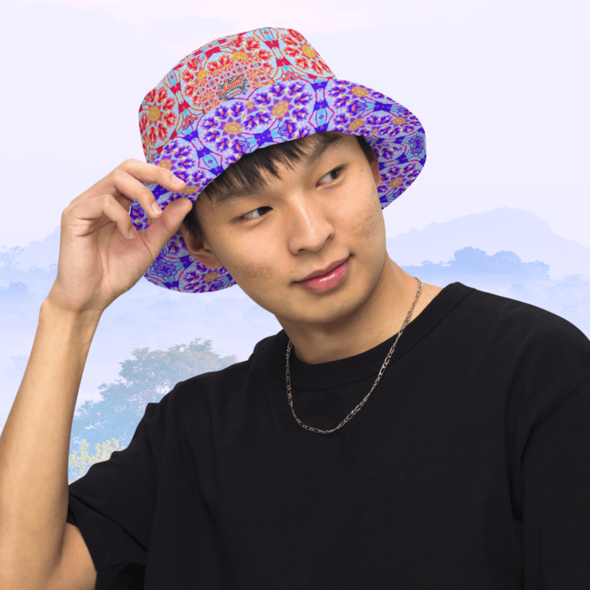 Vibrant Apparel New Zealand Reversible Kaleidoscope Bucket Hat | Purple & Orange Sunburst Festival Hat