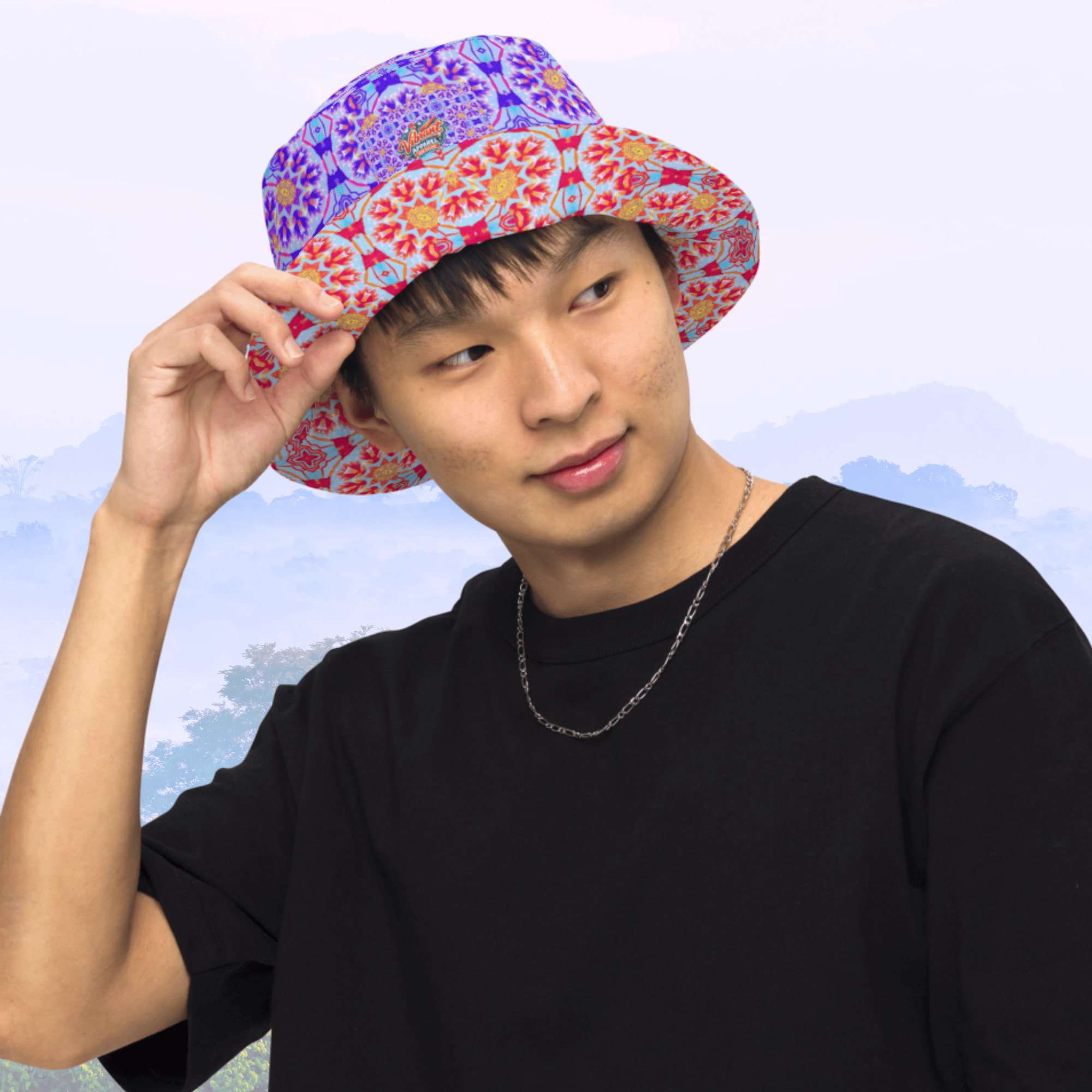 Vibrant Apparel New Zealand Reversible Kaleidoscope Bucket Hat | Purple & Orange Sunburst Festival Hat