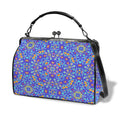 Cobalt Blue Floral pattern kiss lock handbag with top handle and shoulder strap